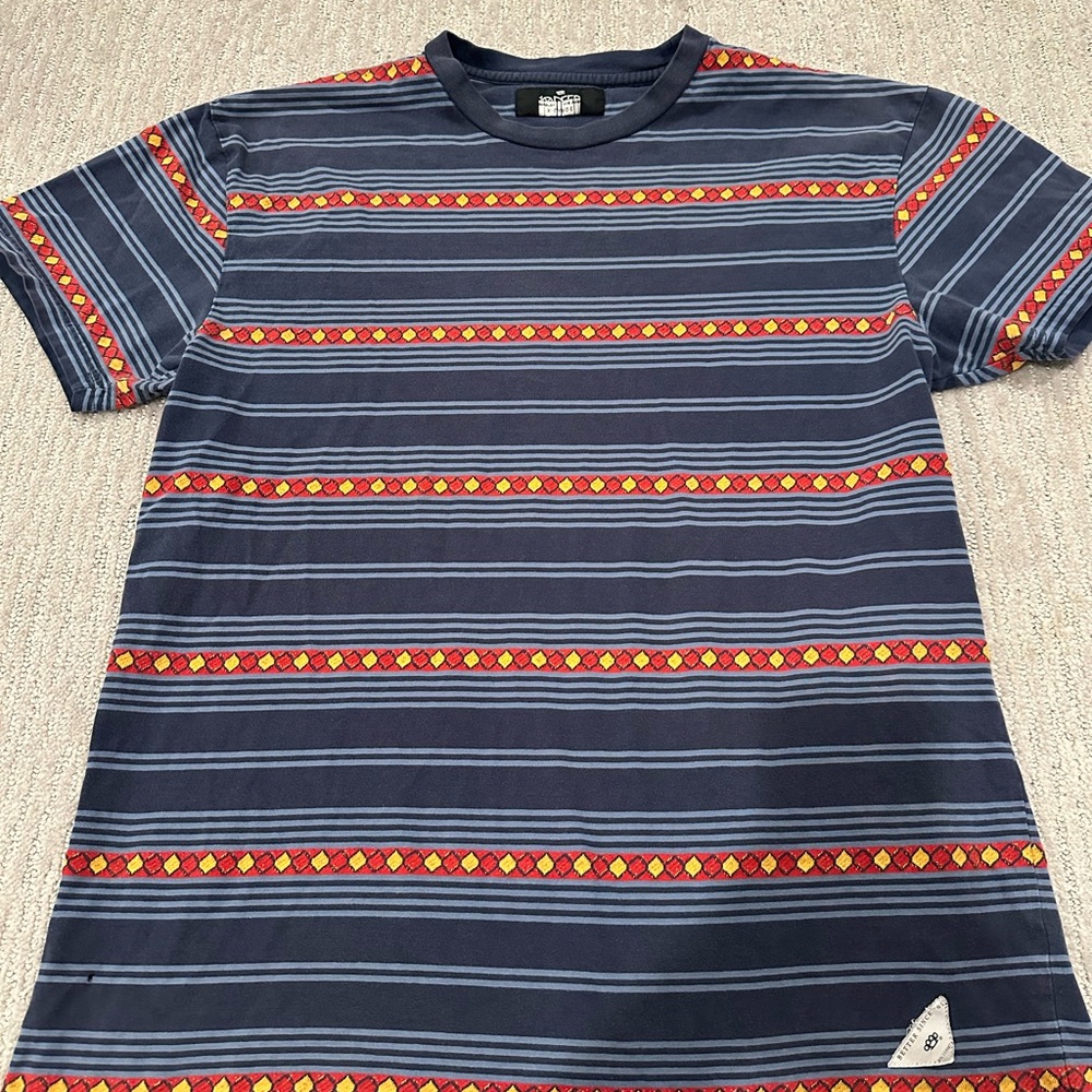 10.Deep Navy Tee with Vibrant Stripes